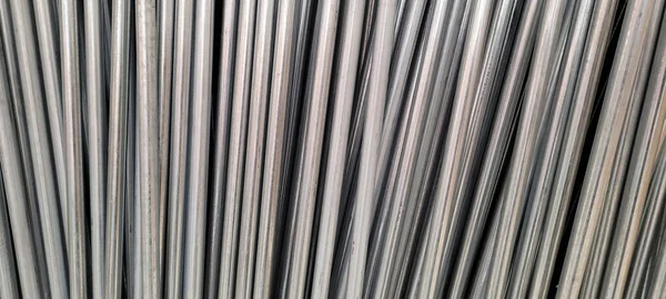 metallic background of aluminum tubes in stock of a work in Brazil