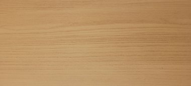 light wood background with abstract veining and texture with shadow