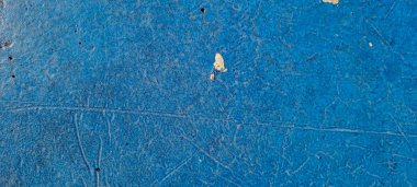 rustic blue background with dark panel texture