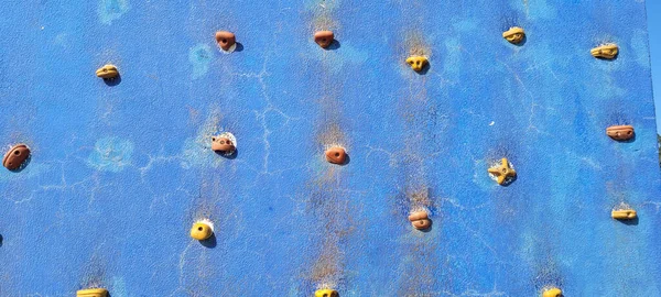 Blue Rock Climbing Wall Rustic Texture Orange Support Points — Stockfoto