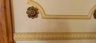 white and gold wall decoration golden background of portuguese crown rose