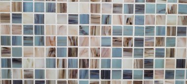 light blue background with checkered mosaic texture, in wallcovering