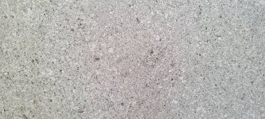 Soyut gri yanmış çimento döşeme desenli koyu renk arka plan panel üzerinde