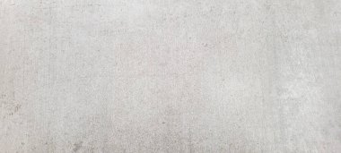 Soyut gri yanmış çimento döşeme desenli koyu renk arka plan panel üzerinde