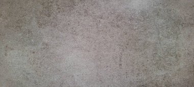 Soyut gri yanmış çimento döşeme desenli koyu renk arka plan panel üzerinde