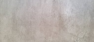Soyut gri yanmış çimento döşeme desenli koyu renk arka plan panel üzerinde