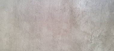 Soyut gri yanmış çimento döşeme desenli koyu renk arka plan panel üzerinde