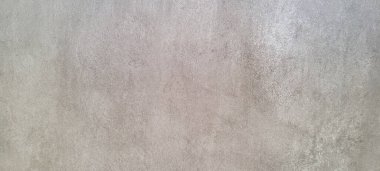Soyut gri yanmış çimento döşeme desenli koyu renk arka plan panel üzerinde
