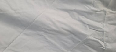 plain crumpled white fabric without folded marks, which can be used as a background