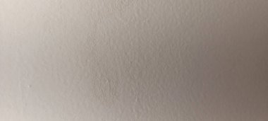 Soyut gri yanmış çimento döşeme desenli koyu renk arka plan panel üzerinde