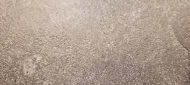 Soyut gri yanmış çimento döşeme desenli koyu renk arka plan panel üzerinde