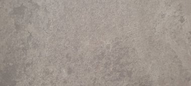 Soyut gri yanmış çimento döşeme desenli koyu renk arka plan panel üzerinde