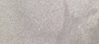 Soyut gri yanmış çimento döşeme desenli koyu renk arka plan panel üzerinde