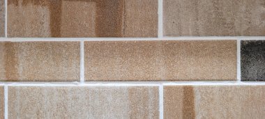 background of clay bricks in masonry wall of house in countryside of Brazil
