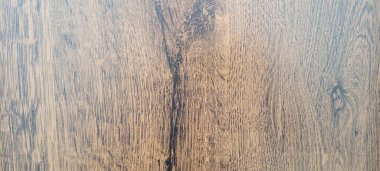 Soyut panelde koyu damarları olan rustik ahşap arkaplanı aydınlat