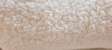 Kış için yumuşak kahverengi kabarık battaniye arka plan olarak kullanılabilir.