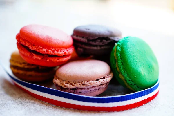 Macaroons with ribbon in the colors of the French flag