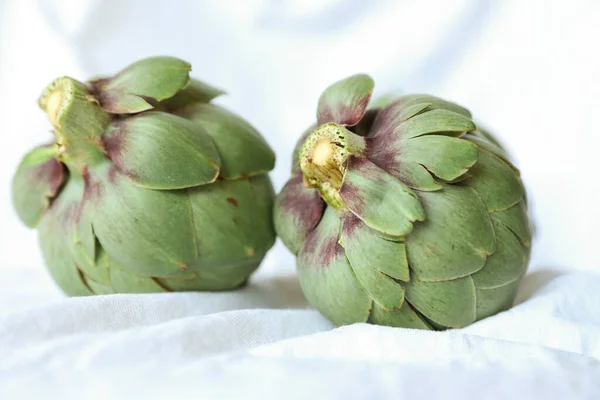 Fresh artichoke on white background. Two whole green artichokes mockup, — Stock Photo, Image