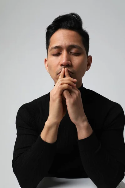 Vertical headshot of Asian man with closed eyes and negative face expression. — 스톡 사진