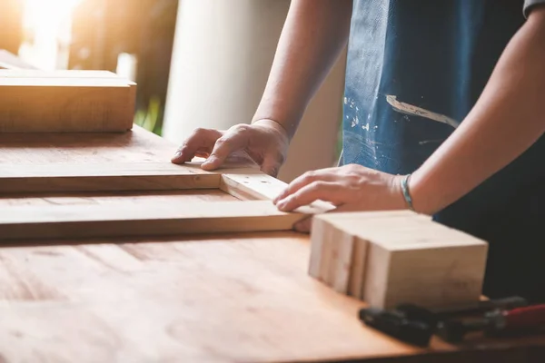 Carpenter Measures Planks Assemble Parts Build Wooden Table Customer — Stockfoto