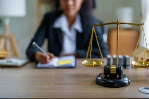 Portrait of a female lawyer, African Americans working at the office to study the case before litigation with the parties