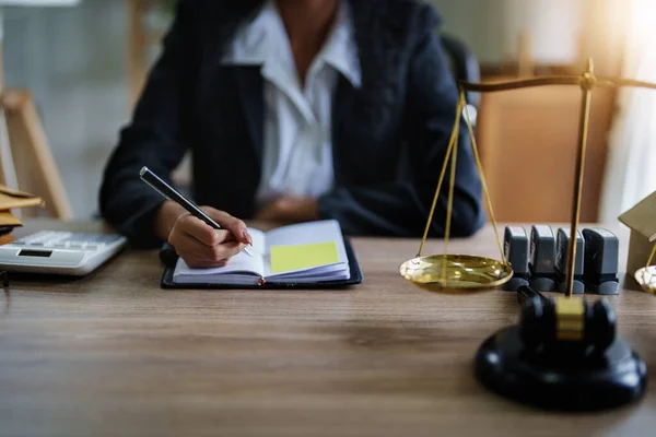 Portrait of a female lawyer, African Americans working at the office to study the case before litigation with the parties