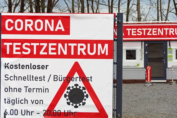 Info sign of a Corona test center in Germany