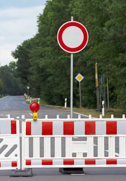 Full closure with signs due to construction work, portrait format