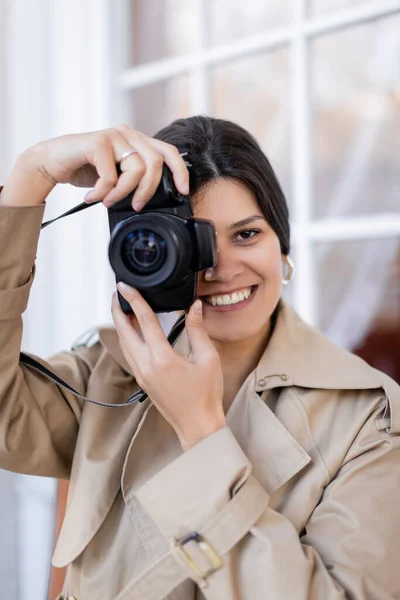 Happy Photographer Trench Coat Taking Photo Digital Camera — Stock Photo, Image