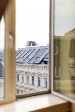 view from blurred window on rooftop of urban building