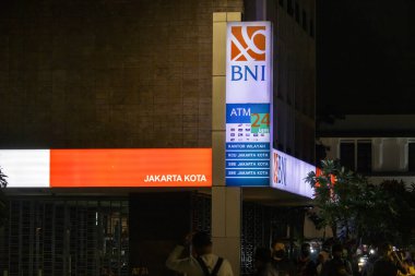Jakarta, Indonesia - August 20, 2022: Jakarta business district with BNI building in front