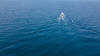 Jakarta, Indonesia - August 20, 2022:Classic sailboat sailing, aerial view