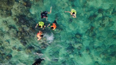 Jakarta, Indonesia - August 20, 2022: High Angle View Of Man Swimming In Sea