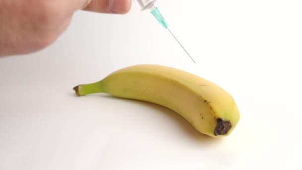 Use Syringe Inject Substance Banana Concept Using Harmful Substances Growing — стоковое видео