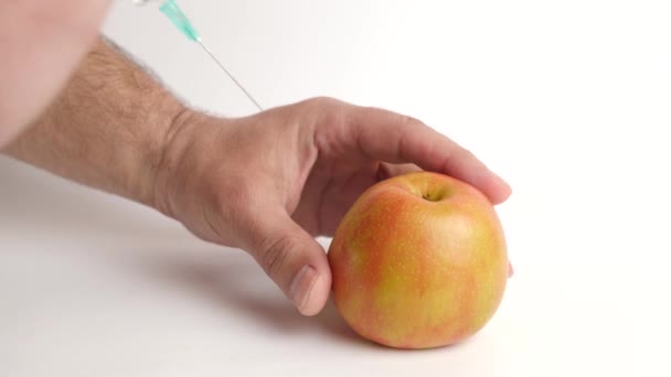 Use Syringe Inject Substance Apple Concept Using Harmful Substances Growing — Stockvideo