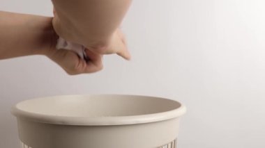 Paper is discarded for recycling and disposal