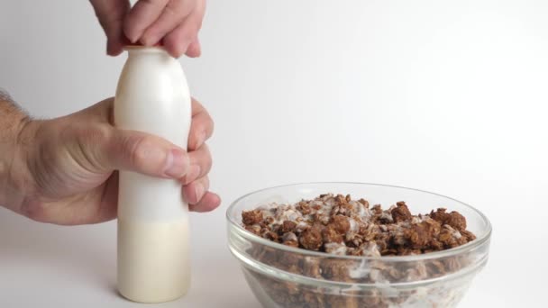 Yogurt Poured Transparent Bowl Granola White Background Healthy Food — Vídeos de Stock