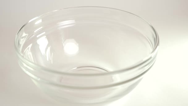 Granola Poured Transparent Bowl White Background Healthy Food — Vídeos de Stock