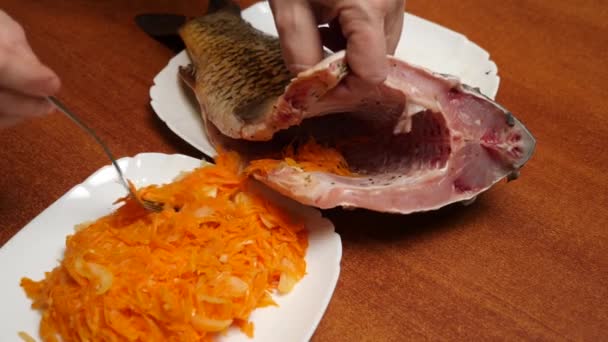 Cooking Fish Stuffed Carrots Onions — Vídeo de Stock