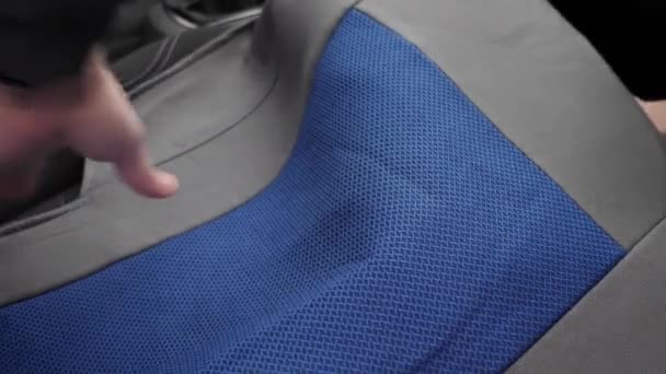 Man Pulls Cloth Cover Car Seat Concept Using Car Accessories — Wideo stockowe