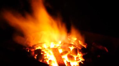 Crucible with a hot metal blank for forging.