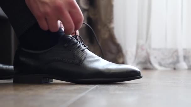 Man Puts New Leather Shoes Ties Laces — ストック動画