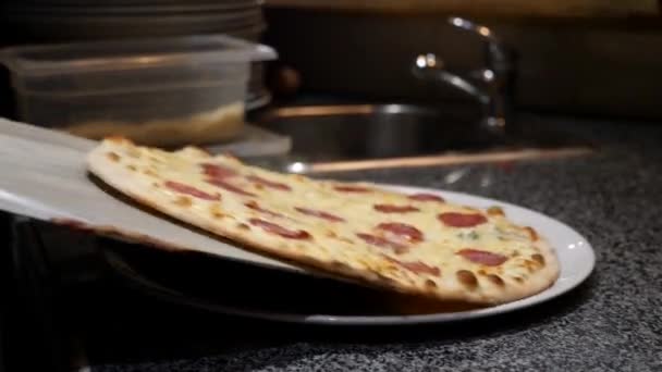 Removing Finished Hot Pizza — Video