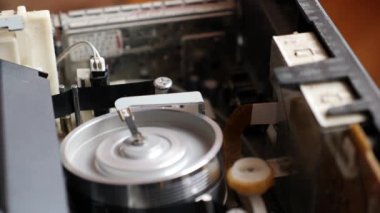 The work of the mechanics of the tape long mechanism. Rewinding the VHS tape
