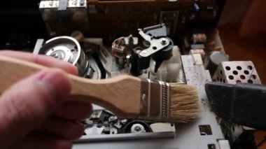 Cleaning and repair of the tape of the extended mechanism of VHS player