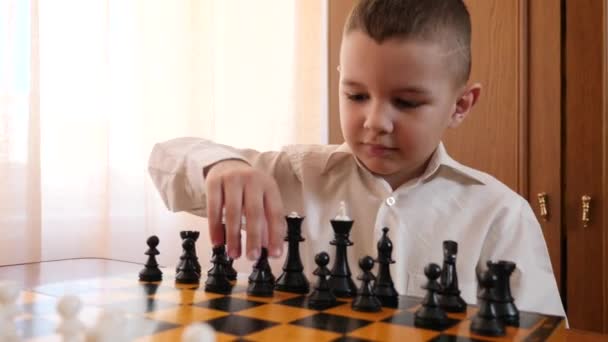 Little Boy Ponders Next Chess Move — Video