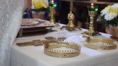 On the throne are crowns for the church wedding of brides.