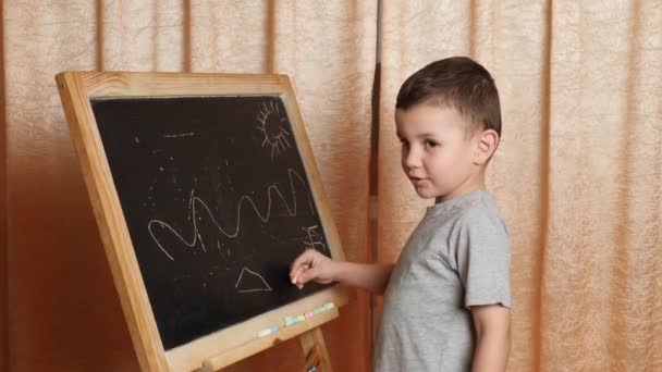 Learning Home Boy Learns Write Chalk Blackboard — Stockvideo
