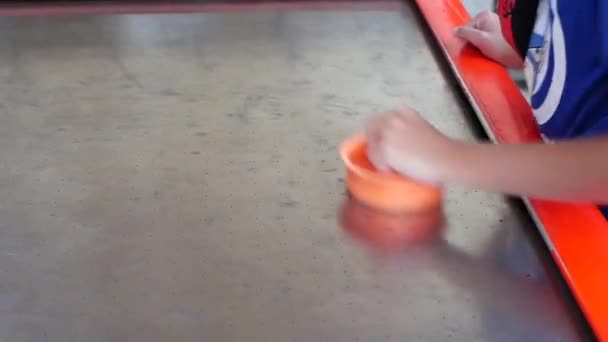 Guy Plays Air Hockey Tries His Best Score Puck Opponent — Stockvideo