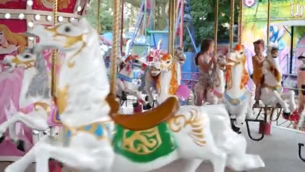 Kids Have Fun Amusement Swing Horseback Entertainment Children — Stockvideo